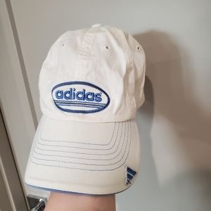White Adidas ball cap with blue print